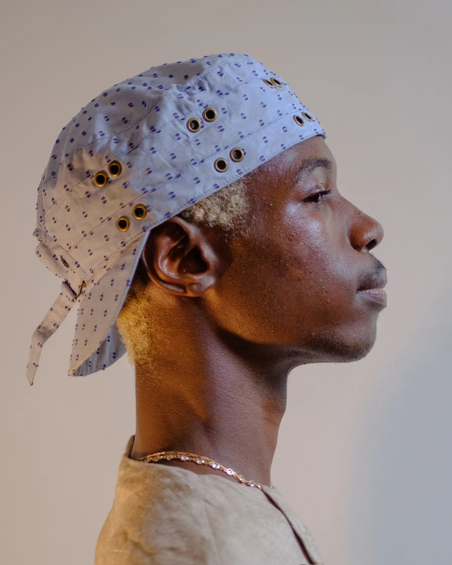 Cap worn with the visor turned to the back